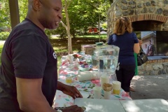 Alex dipping into ice cream